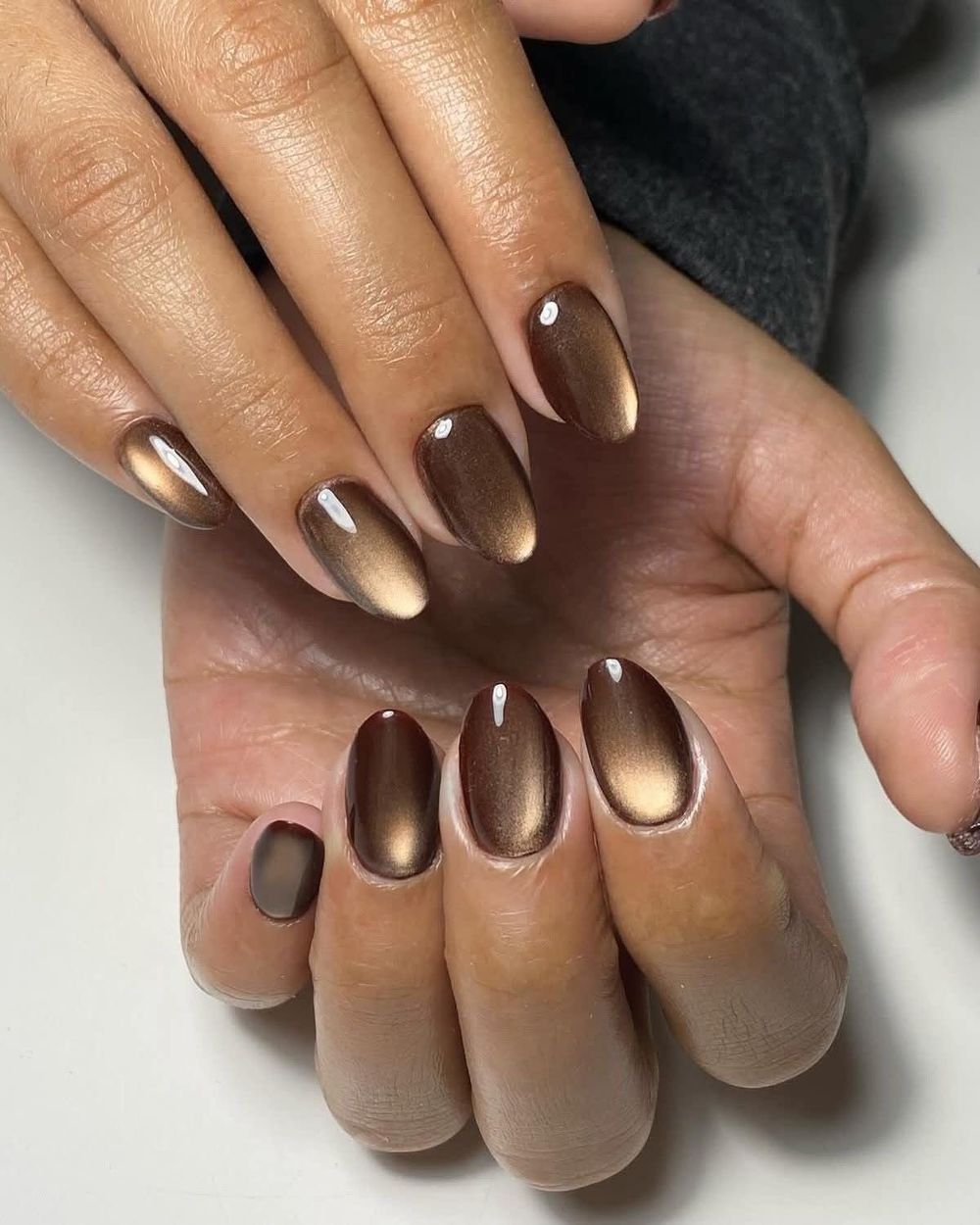 Bronze cat eye oval nails on brown skin, soft bronze magnetic oval set