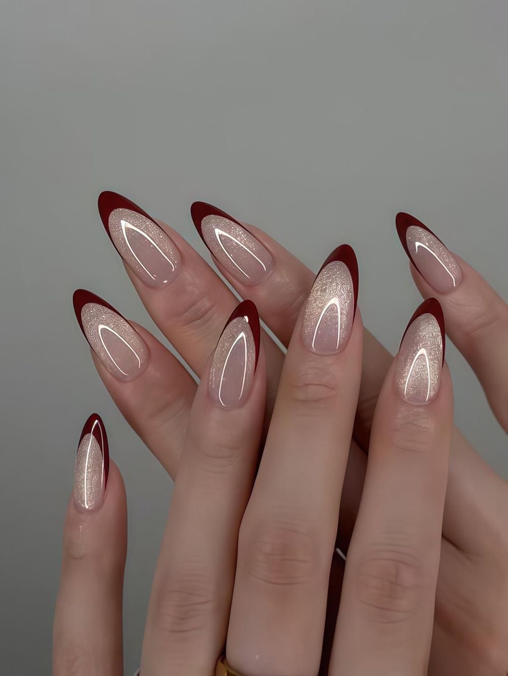 Burgundy French cat eye stiletto nails, burgundy magnetic tips at length