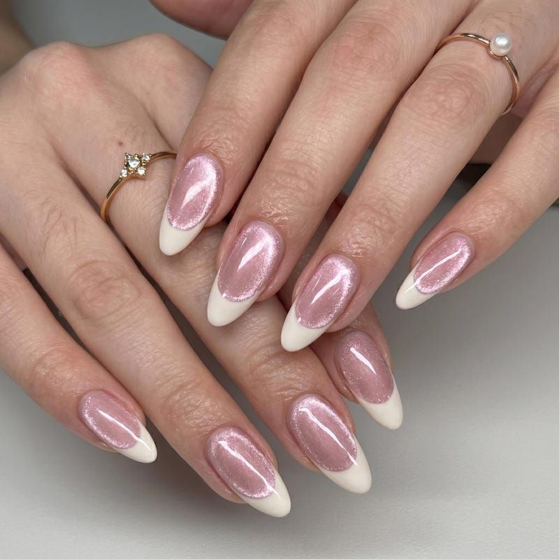 Pink velvet cat eye nails with white French tips, soft glowing pink with white tips