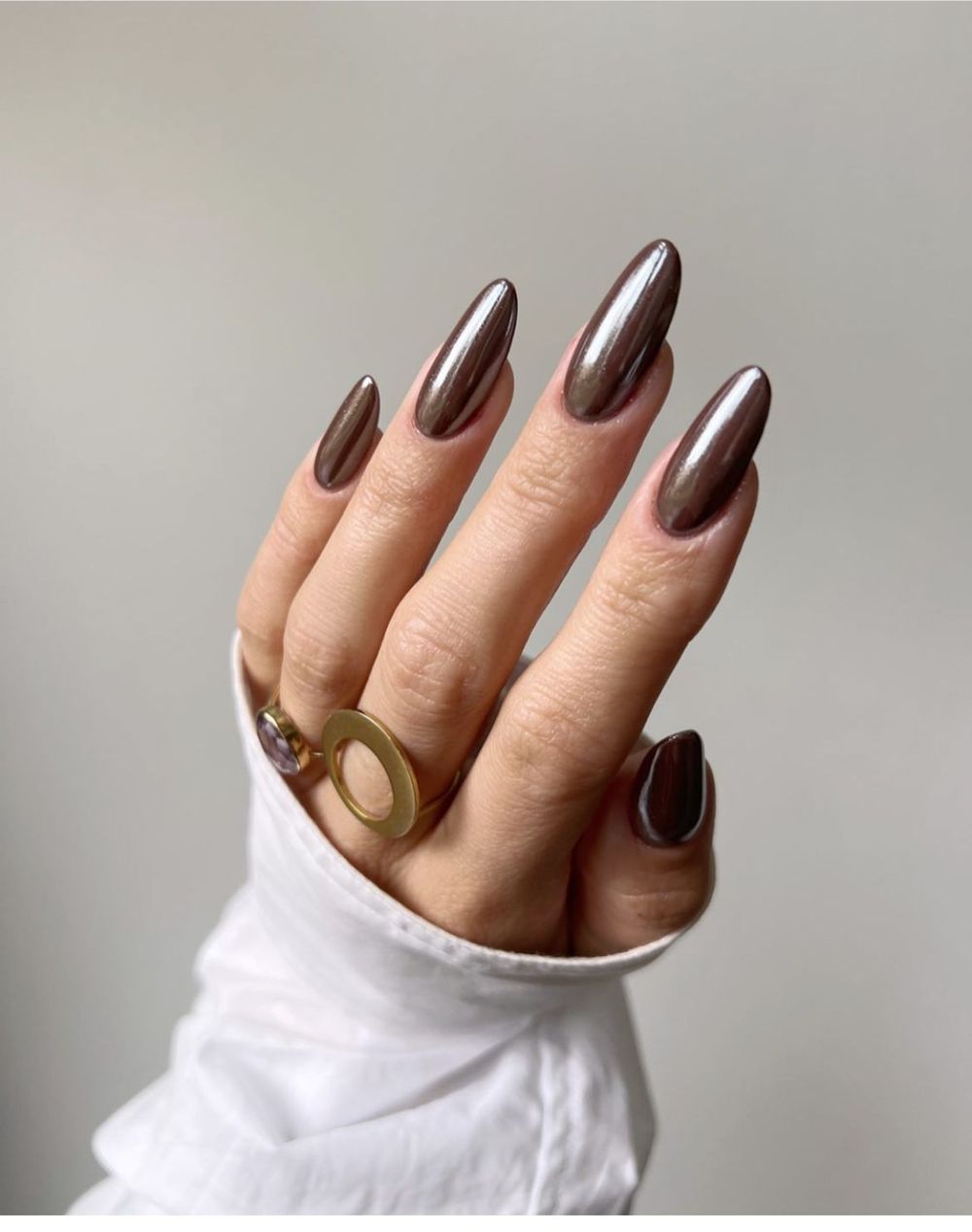 Dark bronze chrome almond nails, deep bronze metallic almond set