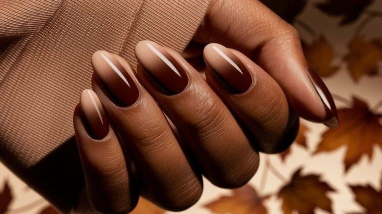 Chocolate ombre almond nails on dark skin, brown gradient set with autumn leaves