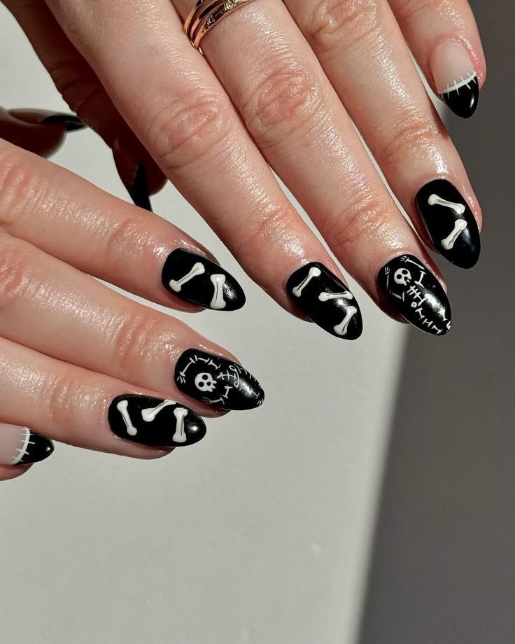 Black short nails with white bone and skull French tip art