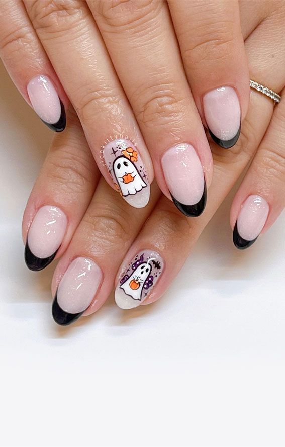 Pink and black French short nails with a ghost art accent nail