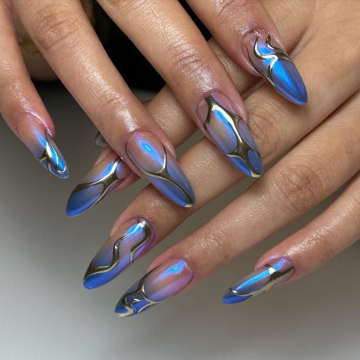 Blue chrome flame art stiletto nails, blue metallic flames at full length