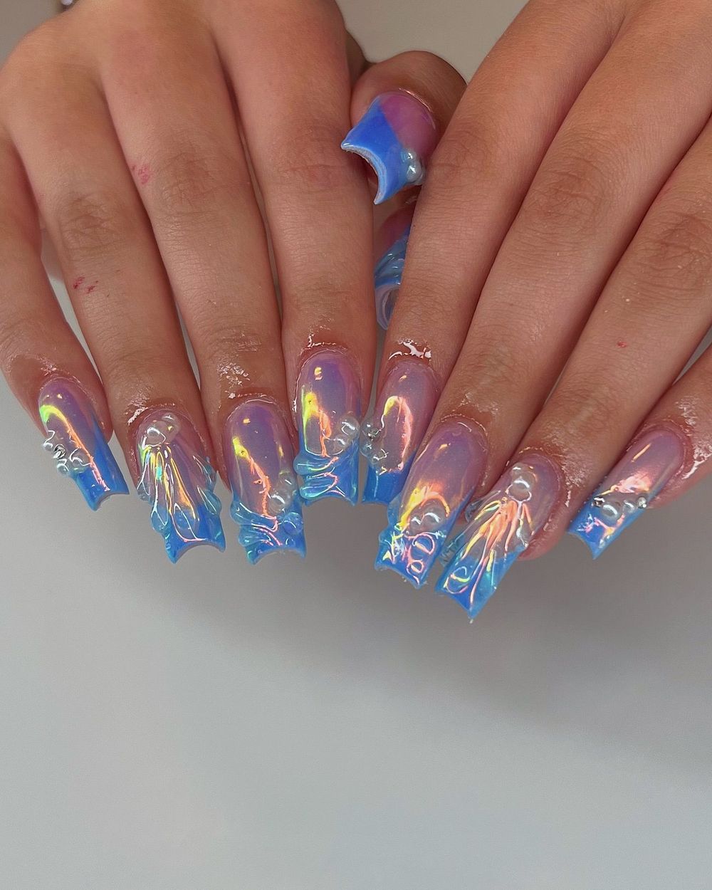 Blue pink aura jelly chrome square nails, two tone glow on a square