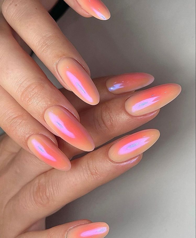Coral aura jelly chrome almond nails, coral glow blended at the center