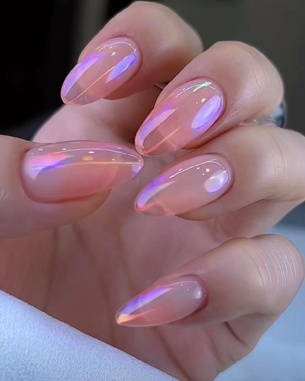 Pink aura jelly chrome almond nails, translucent pink with a glowing aura center