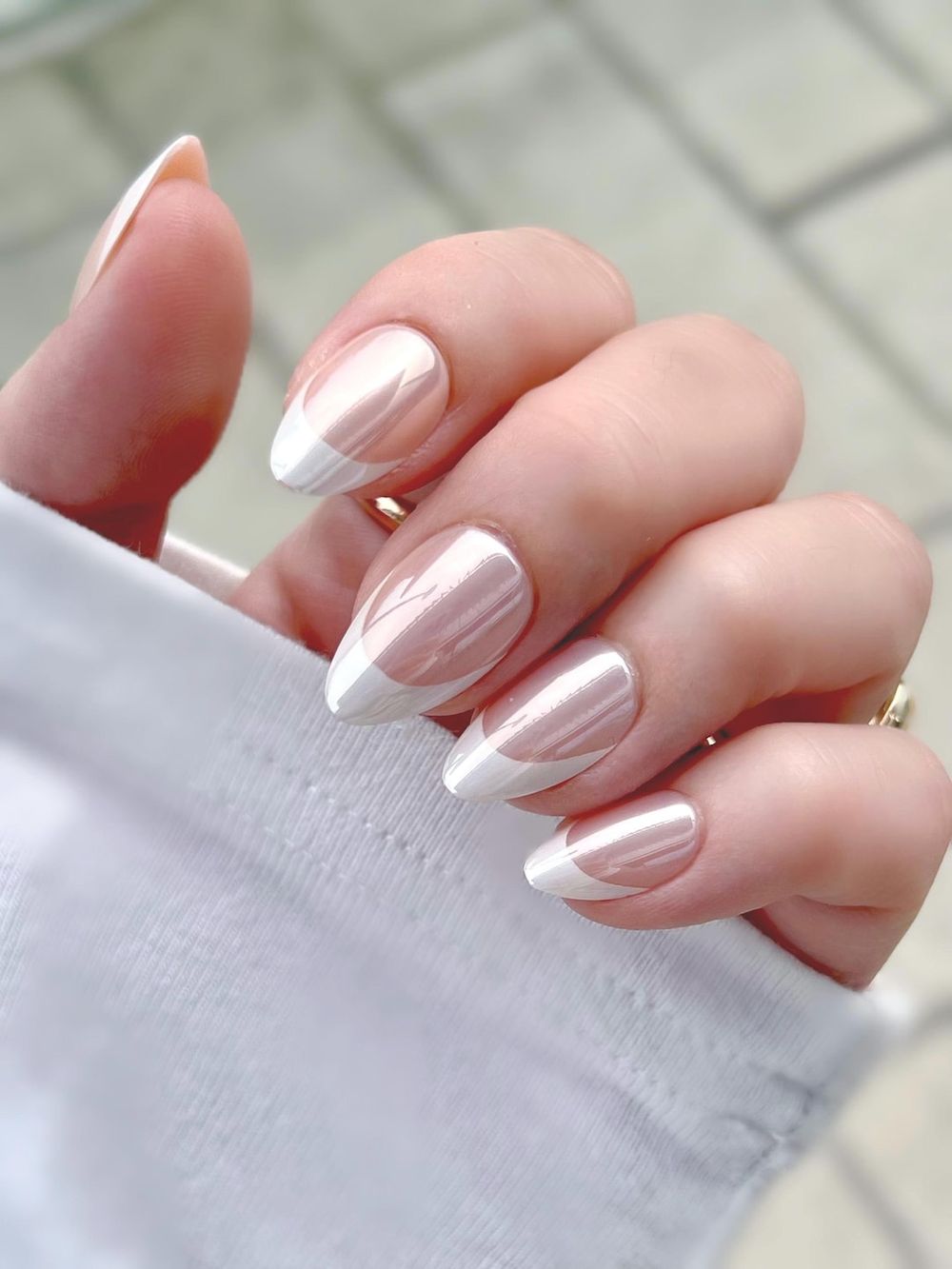 Milky French chrome almond nails, milky base with glazed brighter tips