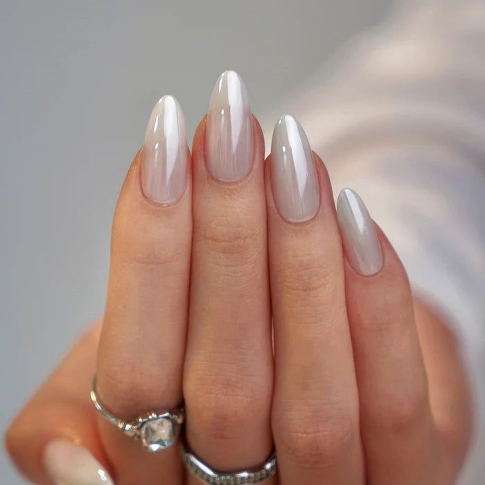 Milky grey chrome almond nails with silver rings, grey toned metallic set