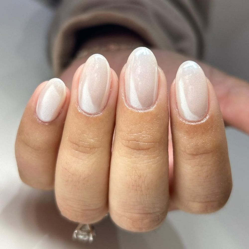 Milky white oval nails with a satin sheen, soft matte glow oval set