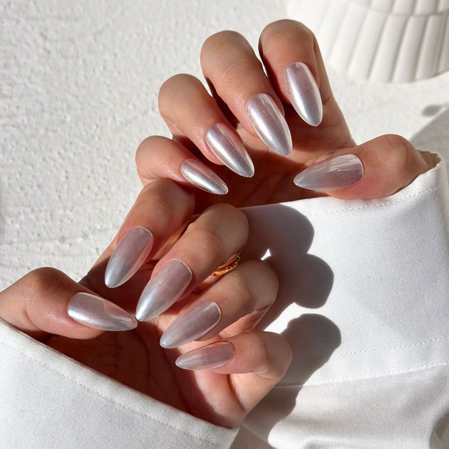 Silver chrome almond nails in sunlight, silver mirror finish in daylight