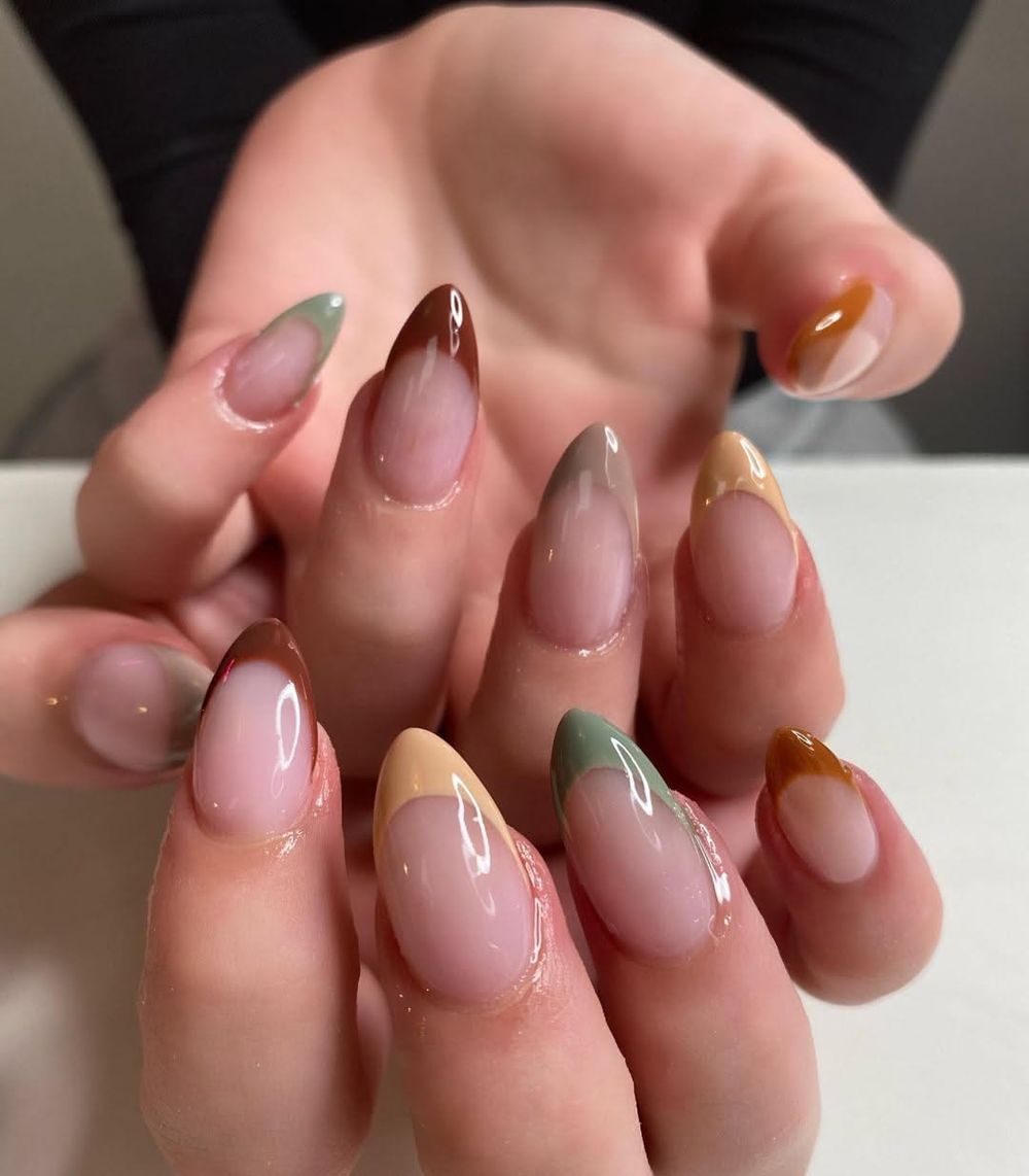 Fall multicolor French almond nails, each tip a different autumn shade