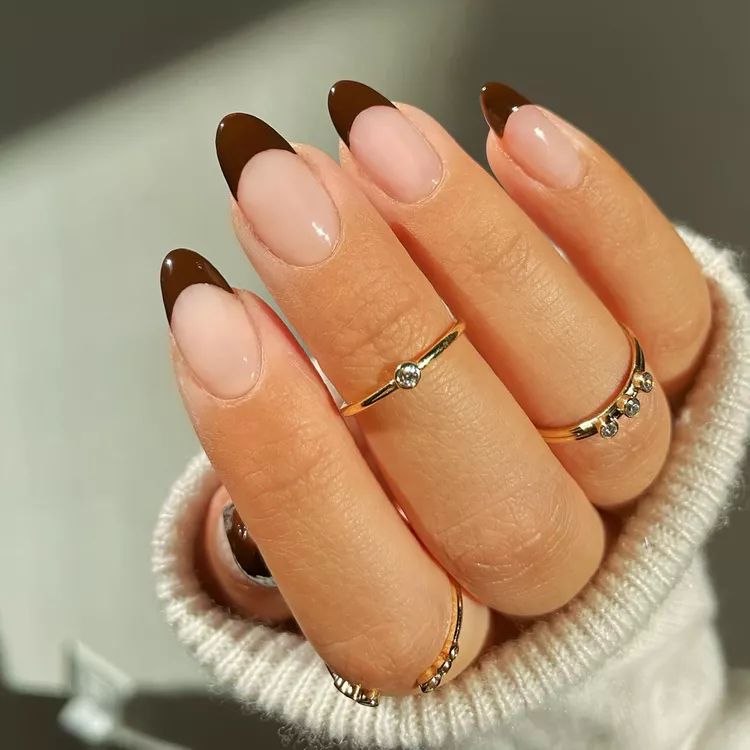 Glossy chocolate French almond nails, nude base with rich brown tips