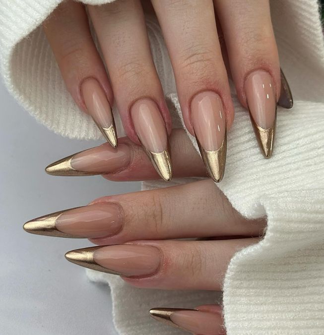 Gold chrome French stiletto nails, mirror gold tips at full length