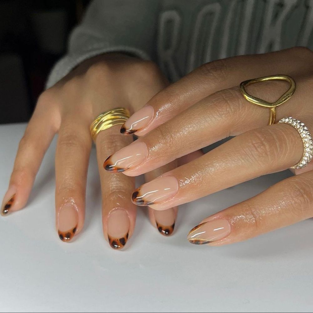 Tortoiseshell French short nails, nude base with tortoise tips at short length