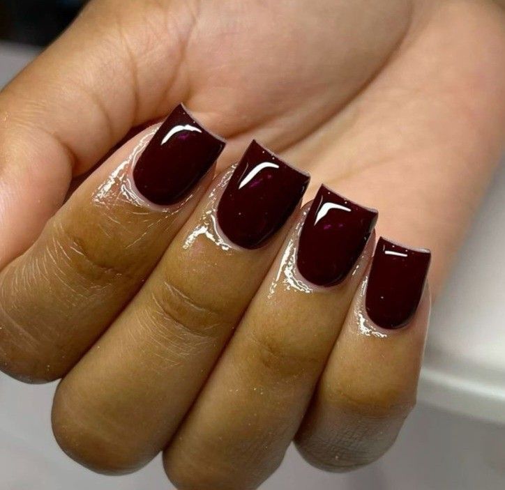 Black cherry short square nails on brown skin, very dark red glossy short set
