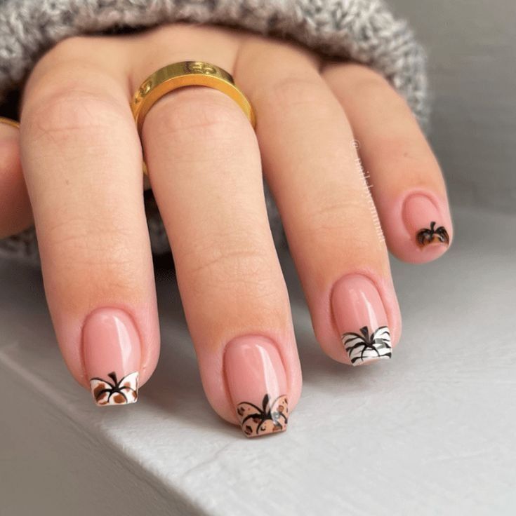 Bow accent short French nails, nude French tips with tiny bow art on the accents