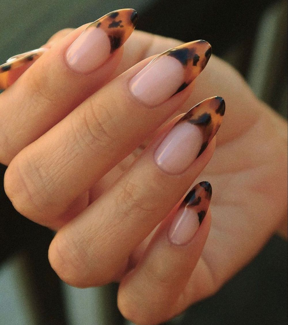 Tortoiseshell French almond nails, nude base with tortoise tips