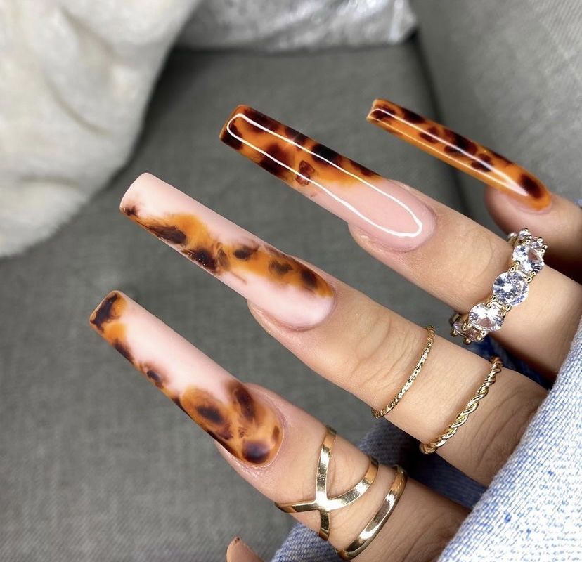 Tortoiseshell French coffin nails, long nude base with amber tortoise tips